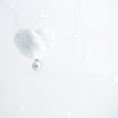 White cloud with christmas tree decoration. New year minimal concept.