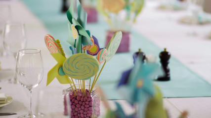 Details of a tasty candy bar with jugs of sweets, cookies and marshmallows, Candy, waffles, cookies...