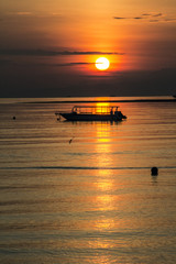 Beautiful Boat Sunset in Bali Indonesia