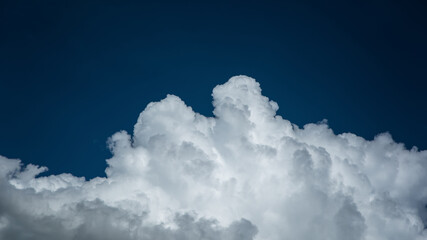 Closeup cumulus cloud with blue sky, Convectional and veretical clouds