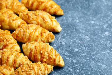 Salted caramel croissants. Topped with a caramel drizzle and a sweet and salty crumble.
