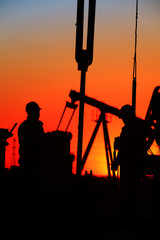 Fototapeta na wymiar oil field, the oil workers are working