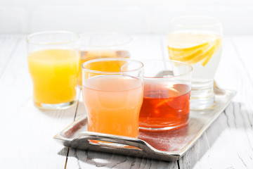 fresh citrus juices in glasses
