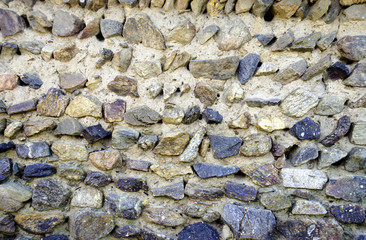 Stone and earth fence