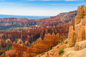 Scenic view of beautiful red rock hoodoos and the Amphitheater from Sunset Point, Bryce Canyon National Park, Utah, United States - Powered by Adobe