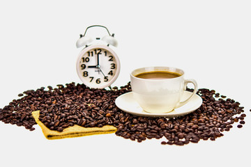 Roasted coffee beans in a small canvas bag