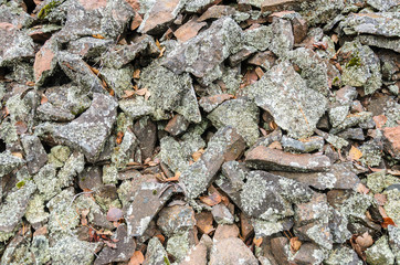 Texture - a pile of light granite stones, close up