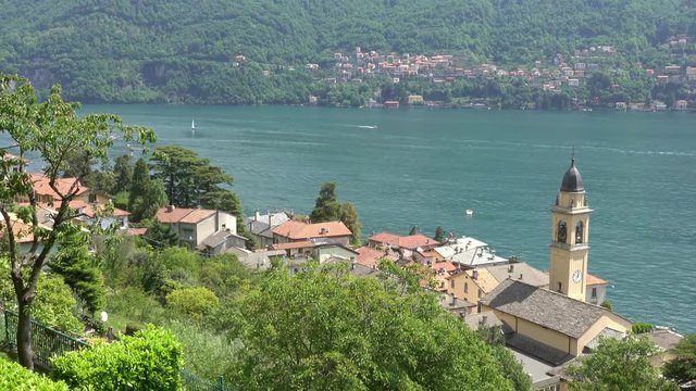 Old church in town at the coast of Como lake, Italy, 4k
