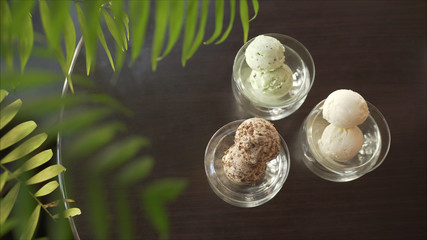 Ice cream balls on the table. Ice-cream on plates