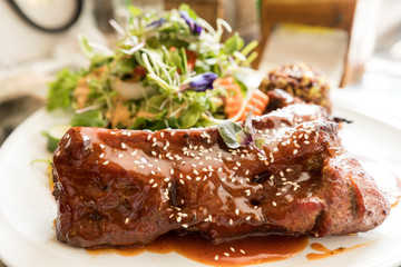 BBQ Grilled spare ribs with Vegetable salad background