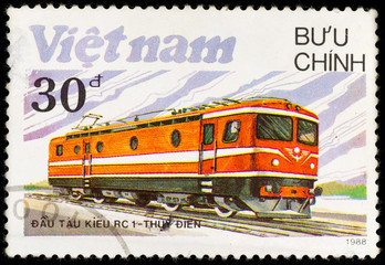 Old vintage postage stamp soviet locomotive and railway, printed in Vietnam in 1988