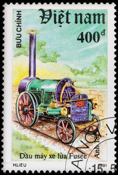 Old postage stamp with retro steam german locomotive and railway, printed in Vietnam in 1991