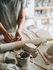 Woman Working At Pottery Studio