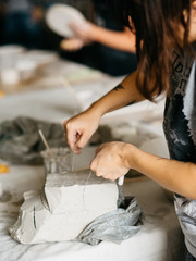 Woman Working At Pottery Studio