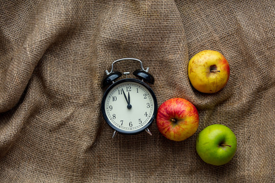 Apples and alarm clock