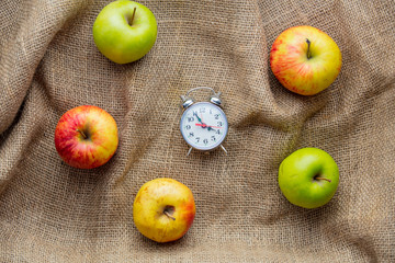 Apples and alarm clock