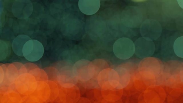 Night abstract background is defocused with nice bokeh. Blurred Christmas Lights Bokeh. Pan across blur .