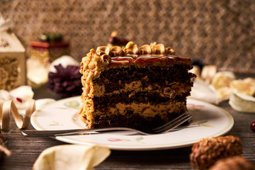 Slice of peanut cake with chocolate