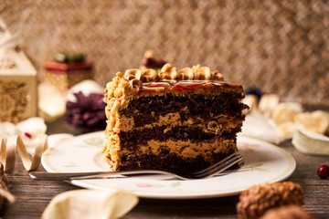 Slice of peanut cake with chocolate