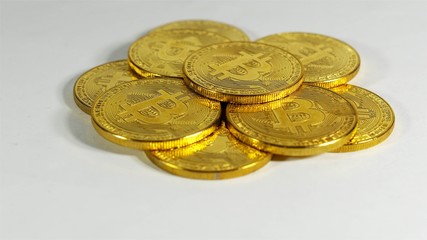 Rotating Stack Of Gold Bitcoins On Turntable