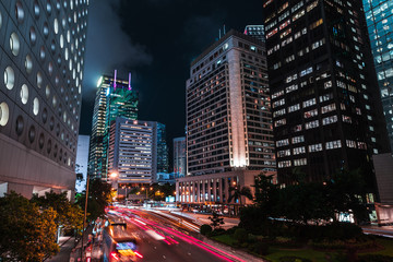 Naklejka premium Night cityscape with blurred car lights