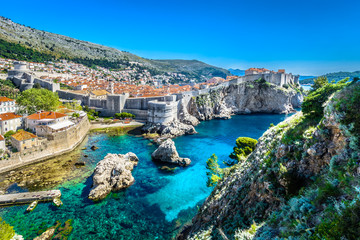 Croatia landscape cityscape Dubrovnik. / Aerial panoramic view at famous european travel destination, Dubrovnik cityscape on Adriatic Coast, Croatia. - obrazy, fototapety, plakaty