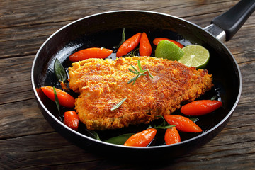 white fish steak with glazed carrots