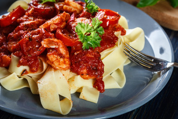 Pappardelle pasta with shrimp, tomatoes and herbs
