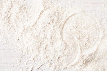 The background image is a flour on a white table. View with copy space