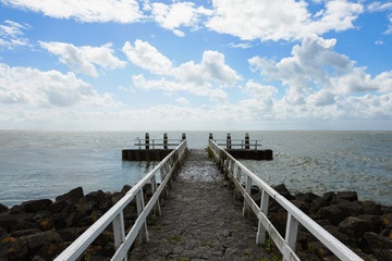 Jetty and clouds