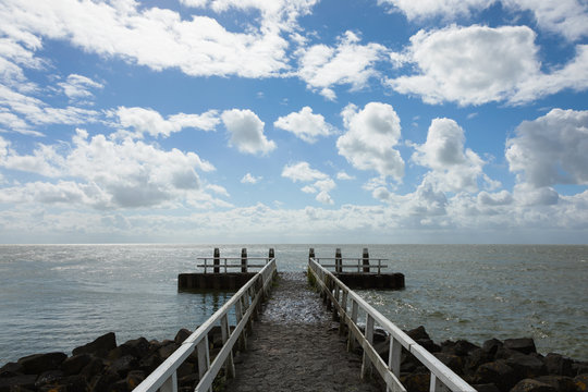 Jetty and clouds