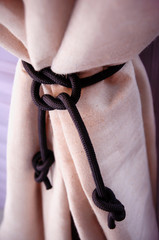 black knot on linen cloth