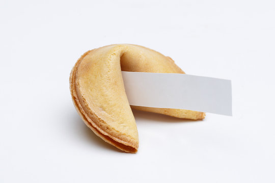 Chinese cookie with wish on empty white background. Empty wish paper