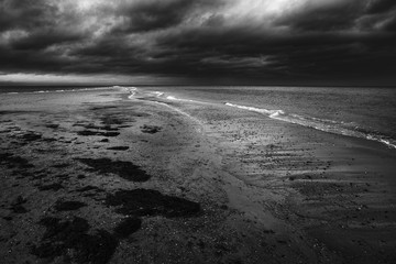 View of the beach on a cloudy day