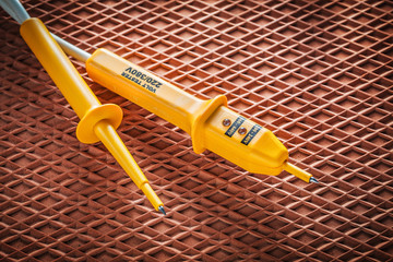 Electrical tester on dielectric rubber matting