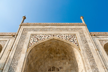 Fototapeta na wymiar The Taj Mahal is an ivory-white marble mausoleum in India