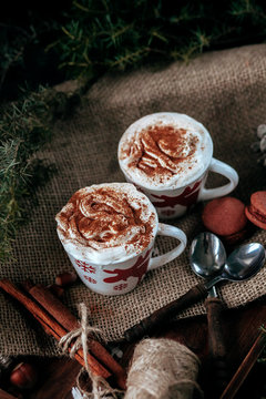 Enamel cup of hot cocoa or coffee for Christmas with whipped cream