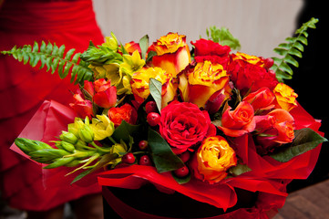 A bouquet of flowers is bright and beautiful for a girl