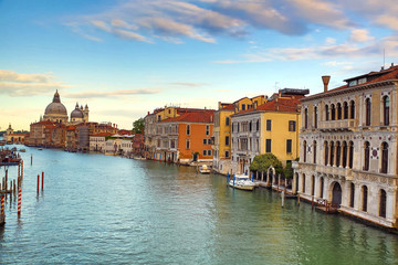 Obraz premium Landscape view of Adriatic Sea with boats and historic buildings in Venice, Italy, Europe.