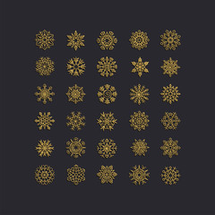 Golden snowflakes icon on black background.