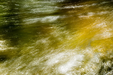 mountain river surface background in motion