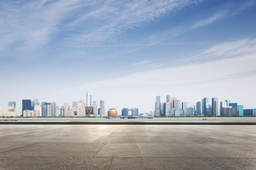 Obraz premium empty marble floor with modern cityscape