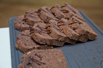 Sliced chocolate cake . Sliced homemade brownies tower. Sweet and moist of chocolate dessert.