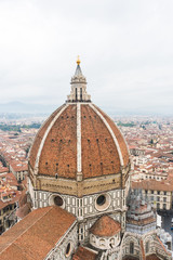 Fototapeta na wymiar Florence, ITALY - October, 2017: Florence or Firenze aerial Florence Duomo. Basilica di Santa Maria del Fiore in Florence, Italy. Florence Duomo is one of main landmarks in Florence