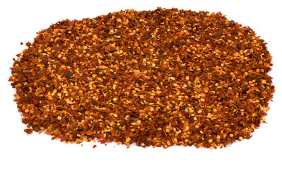 Dried red chili pepper crushes isolated on white background