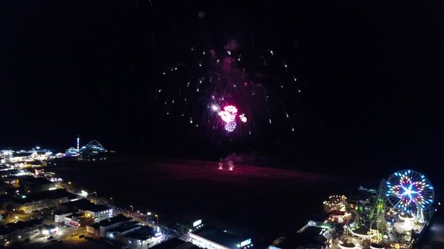 Fireworks over beach on Independence day aerial footage
