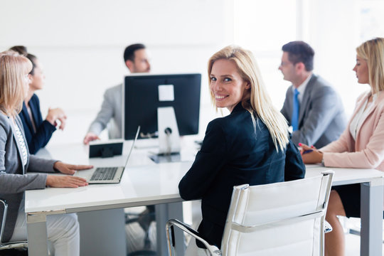 Picture of attractive saleswoman on meeting in office