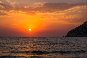Dramatic sunset over the Aegean sea, Gumusluk, Turkey