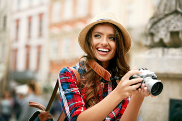 Tourist Woman With Camera Taking Photos Of Beautiful Location - obrazy, fototapety, plakaty