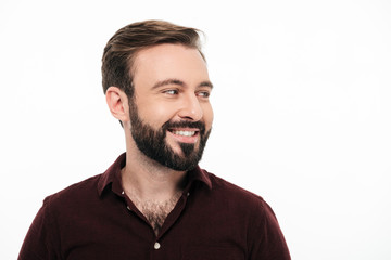 Obraz premium Portrait of a happy cheerful man laughing and looking away